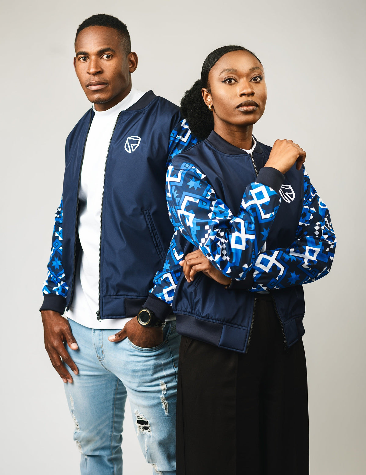 People wearing Standard Bank jackets and golf shirts with African-print panels, made by CCS Apparel
