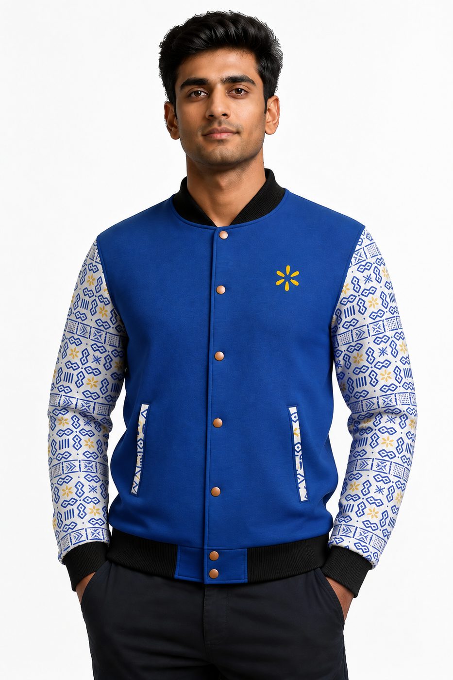 A man in a royal blue varsity jacket with patterned white sleeves and a yellow spark on the chest